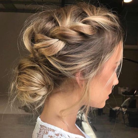 messy loose french braid from front hairline gathered into loose chignon