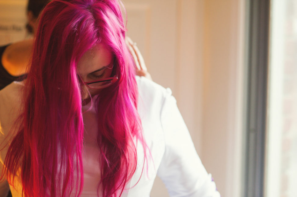 bride with long pink hair and retro pink glasses
